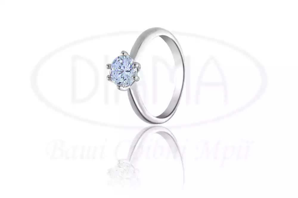 Срібна каблучка з цирконом фото 1